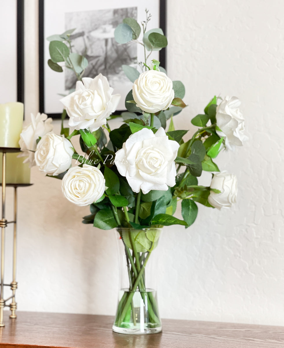 Multi-Colored Floral Arrangement in White Metal Pitcher Silicone